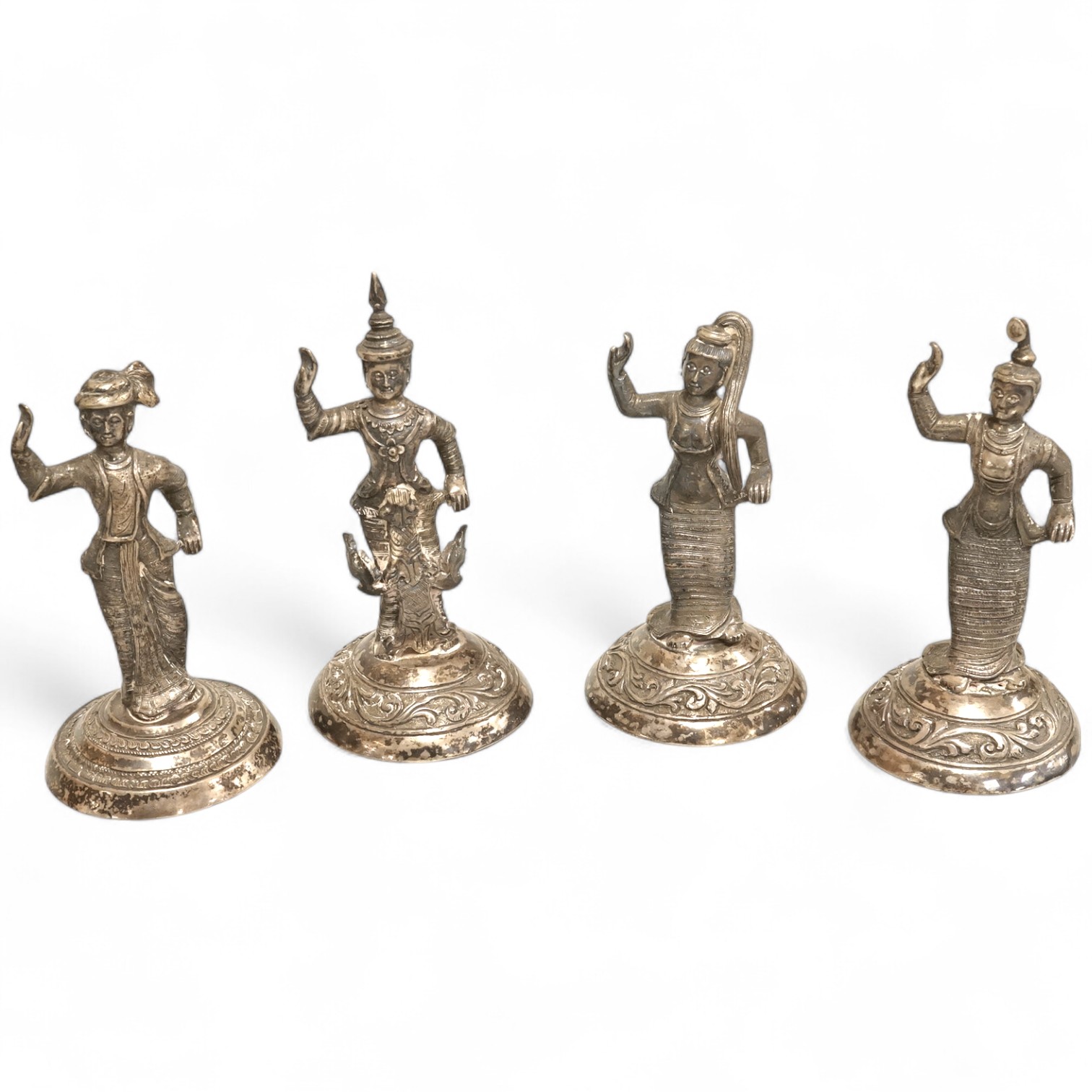 Four early 20th century Thai white metal figurines, 92mm et infra, 11.3oz.